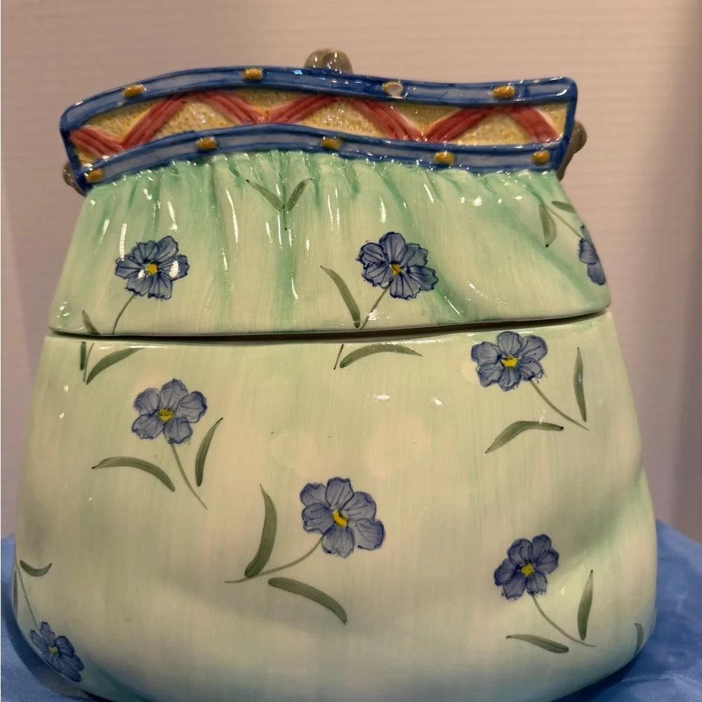 Vintage ceramic cookie jar with lift off lid